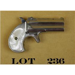 Remington O/U derringer, .41 cal., 3”  barrels, nickel finish, pearl grips, #11.  This gun is in ove