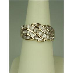 Brilliant 14 karat yellow gold ladies ring  fine set with over 52 round and baguette cut  diamonds w