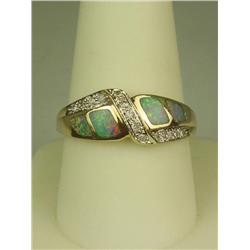 Very fine 14 karat yellow gold ladies  ‘Kabana’ style ring with fine black opal  inlay and side pave