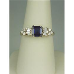 Very high quality 14 karat yellow gold ladies  ring set with a center square cut cobalt  blue sapphi