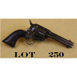 Colt SAA revolver, .32 WCF cal., 4-3/4”  barrel, two line patent address, wood grips,  #17464. This 
