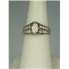 Image 1 : Very high quality 14 karat yellow gold ladies  custom made ring fine set with a center MQ  cut diamo