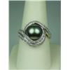 Image 1 : Exquisite 14 karat white gold ladies custom  made ring set with a fine center black  Tahitian pearl 