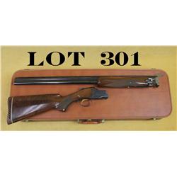 Cased Belgian-made Browning Lightning O/U  shotgun, 12 gauge, 30” barrels, blue finish,  checkered w