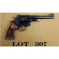 Smith & Wesson Model 25 4-screw DA revolver,  Model 1955 .45 cal., 6-1/2” barrel, blue  finish, targ