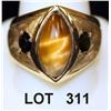 Image 1 : 14kt custom man’s ring, set with tiger eye  center and two accenting dark green stones on  each side