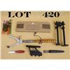 Image 1 : Lot of misc. gun-related items including a  collapsible gun bench rest, an old Western  hand trap th