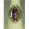 Image 1 : Superb 14 karat yellow gold ladies heavy  custom made ring set with a large oval  Amethyst weighing 