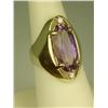 Image 2 : Superb 14 karat yellow gold ladies heavy  custom made ring set with a large oval  Amethyst weighing 