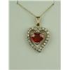 Image 1 : Charming 14 karat yellow gold ladies custom  made pendant set with a very fine heart shape  Mandarin