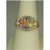 Image 1 : Charming 14 karat yellow gold ladies ring set  with nine multi-colored sapphires weighing  approx. 3