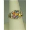 Image 2 : Charming 14 karat yellow gold ladies ring set  with nine multi-colored sapphires weighing  approx. 3