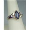 Image 1 : Stylish 14 karat yellow gold ladies ring set  with a center MQ cut Ceylon type color  sapphire weigh