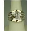Image 1 : Stunning 14 karat yellow gold ladies custom  made ring channel set with a combination of  round, pri