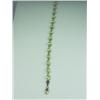 Image 1 : Charming 10 karat yellow gold ladies bracelet  fine set with 19 oval cut green peridot  weighing app