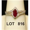 Image 1 : Ladies ring with 0.30ct marquee ruby and  .18ct in diamonds, in 14kt yellow gold. Est:  $500 - $800