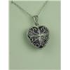 Image 2 : Very finely carved 10 karat white ladies  antique style heart design pendant set with a  cabochon Am