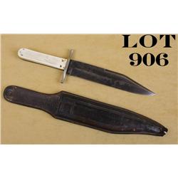 Large Bowie style knife approx. 13” overall  with an approx. 8” blade, bone grips, simple  cross gua