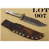 Image 1 : Medium-sized hunting knife with brass tack  studded leather scabbard, knife approx.  10-1/2” overall