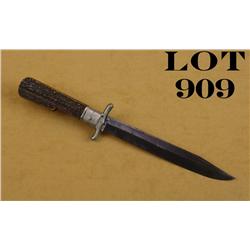 Large folding knife with stag grips approx.  12” overall with an approx. 7-1/2” blade.  This knife i