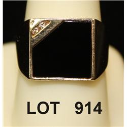 One unique style mans ring set with custom  cut onyx and 2 diamonds in 14kt yellow gold,  approx wt 