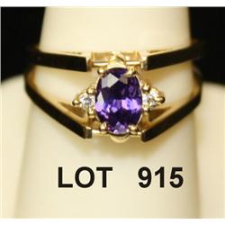 One ladies convertible ring. Interchangeable  to oval amethyst and oval cz. 14kt yellow  gold (appro