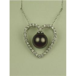 Charming 10 karat white gold ladies heart  design pendant fine set with a black Tahitian  pearl aver