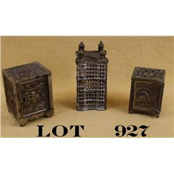 Lot of three early metal banks, two  constructed like banks, the first is approx.  4” x 2-1/2” x 2-1