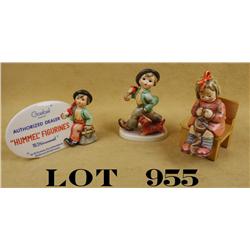 Lot of three Hummel figurines by Goebel, two  in factory boxes, all in excellent condition  at time 