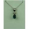 Image 1 : Pleasant 14 karat white gold ladies pendant  set with a pear shape Chatham created emerald  weighing