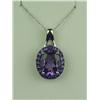 Image 1 : Vibrant 10 karat white gold ladies pendant  set with a center Amethyst weighing approx.  3.00 carats