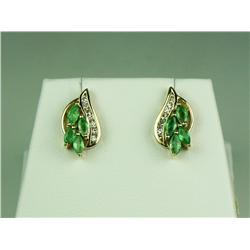 Attractive 14 karat yellow gold ladies  earrings set with 8 MQ cut green emeralds and  channel set w