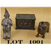Image 1 : Lot of three old metal banks including a  clown approx. 6” tall, a lion approx. 4” x  5”, and a safe