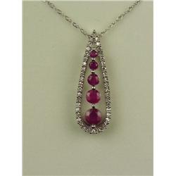 Elegant 10 karat white gold ladies pendant  set with 5 red rubies and 42 round diamonds  weighing ap