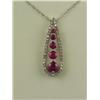 Image 1 : Elegant 10 karat white gold ladies pendant  set with 5 red rubies and 42 round diamonds  weighing ap