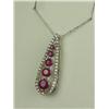 Image 2 : Elegant 10 karat white gold ladies pendant  set with 5 red rubies and 42 round diamonds  weighing ap