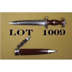 German SA dagger and sheath approx. 14-3/4”  overall with an approx. 9” blade marked  “Gebr. Grafrat