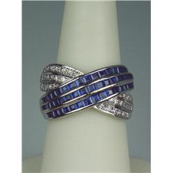 Terrific 18 karat white gold heavy ladies  custom made ring channel set with over 50  baguette cut C