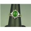 Image 2 : Very high quality 14 karat two-tone gold  ladies ring set with a center fine apple  green Jade weigh