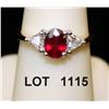 Image 1 : Ladies ring in platinum and 18kt gold, set  with fine oval ruby weighing 1.20ct and 2  triangle diam