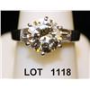 Image 1 : 14kt ladies ring with 3.36ct round brilliant  diamond and 4 tapered baguettes on the sides  (include