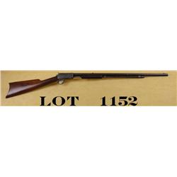Winchester model 1890, .22 long caliber with  takedown frame, serial #43223. The rifle  shows 30-50%