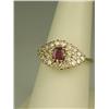 Image 3 : Vibrant 14 karat yellow gold ladies ring set  with a center red ruby weighing approx. 0.60  carats a