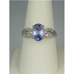 Gorgeous 14 karat white gold ladies ring fine  set with a center Ceylon type color sapphire  weighin