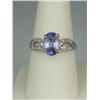 Image 1 : Gorgeous 14 karat white gold ladies ring fine  set with a center Ceylon type color sapphire  weighin