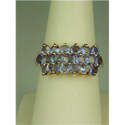 Dazzling 10 karat yellow gold ladies ring set  with 19 round fine color Tanzanites weighing  approx.