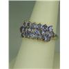 Image 2 : Dazzling 10 karat yellow gold ladies ring set  with 19 round fine color Tanzanites weighing  approx.