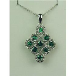 Superb 10 karat white gold ladies custom made  pendant fine set with nine round created  emeralds we