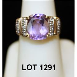 Ladies 14kt yellow gold ring set with 5ct  oval amethyst and .1ct in diamonds.: Est:  $1,000 - $1,20