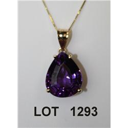 14kt yellow gold pendant set with a 12ct  pear-shape amethyst and box chain. Est: $550  - $750